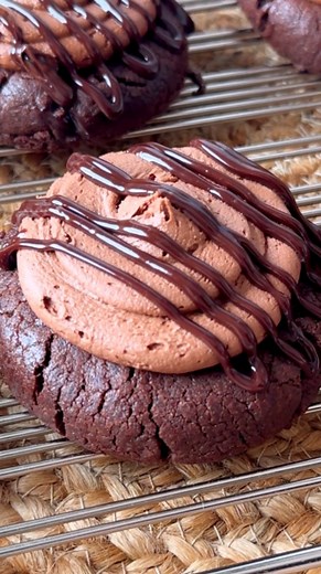Double Chocolate Stuffed Cookies 🍫😋 These are a must bake before the New Year! These chocolate stuffed cookies taste like a chocolate lava cake! They only take 10 minutes to bake. The chocolate ganache center is so good. Full recipe below. Chocolate Ganache: * 1/2 cup chocolate chips * 1/4 cup heavy whipping cream Chocolate Cookies: * 1 1/2 cup all-purpose flour * 1/2 cup Dutch process cocoa powder * 1/2 tsp baking powder * 1/4 tsp salt * 1 1/2 stick unsalted butter, softened * 2/3 cup light b
