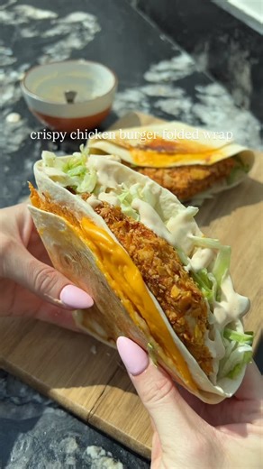 Alex Hughes | Easy Low-Cal Recipes on Instagram: "My most saved recipe of the year and honestly… I’m in no surprise it’s a folded wrap 🤣💕 This crispy chicken burger folded wrap is super easy, ridiculously satisfying, and absolutely BANGING. Crispy cornflake chicken, melty cheese, crunchy lettuce and that burger sauce folded into a golden wrap. Fakeaway heaven but still macro-friendly 🤌🏼 Has anyone made this one yet? ⬇️ If not, save it for later 💕 Ingredients (serves 2): 2 x 115g chicken bre