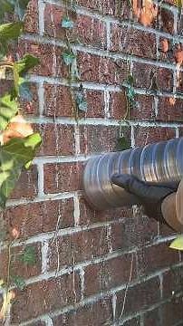 Drilling through brick for a new dryer vent install #dryerventcleaning #diy #hvac #homerenovation