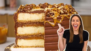 This Twix cake is made with shortbread crusted vanilla cake layers, thick homemade caramel & decadent chocolate buttercream!! Get the recipe here: https://chelsweets.com/twix-cake/ This is the frosting comb I used: https://amzn.to/3Izaxvb | Chelsweets
