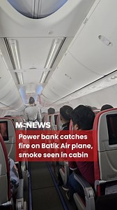 The cabin crew successfully put out the fire that was coming from the luggage compartment. | Mustsharenews.com