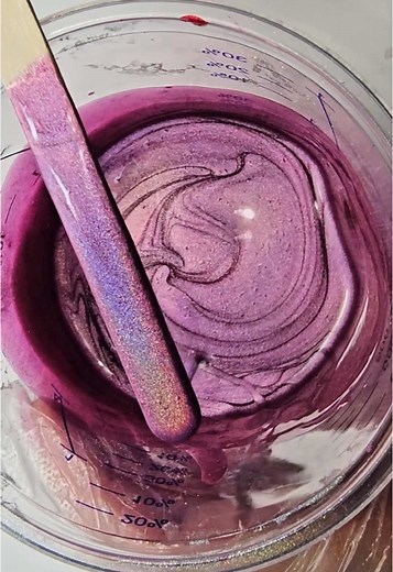 We’re cooking up something exciting in the Cosmic kitchen and while we count down to it, let’s look at some of our fan favourites (and underdogs) over the next few weeks 👀 Today we’ve got some BTS footage showcasing our star of the week, Pink Dawn! 🩷 See the world through rose-coloured glasses with Pink Dawn, a light pink linear holographic polish. The whole world is brighter with holo! 2-3 coats for full opacity. 💖 #nailpolish #holographicnails #cosmicpolish #nailsnailsnails #holographic #na