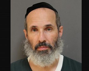 Rabbi charged with refusing to let woman out of his car in Lakewood