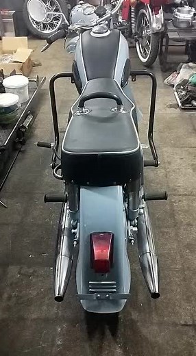 Vintage JAWA Motorcycle Showcase in Blue and Silver