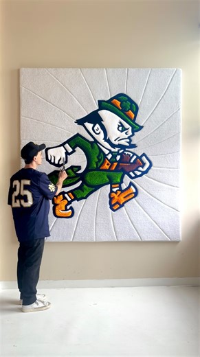 D A V I D • N O T T on Instagram: "• N O T R E • D A M E • 82 hours & 28,000 yards of yarn to create ☘️ The Leprechaun has represented the Fighting Irish for over 60 years. Now, a football-specific version joins the tradition. Crafted into a custom piece in collaboration with @thefightingirish #goirish"