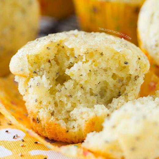 These honey lemon chia seed muffins are SO light and fluffy thanks to one special ingredient! We love making these to give us a little reminder of Spring! | Table for Two