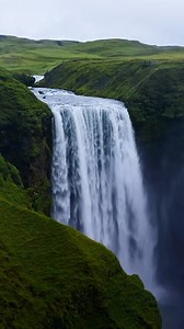 Skógafoss isn’t just a stunning 60-meter waterfall, it’s steeped in Icelandic legend! 🌊🌈 According to local lore, a Viking settler hid a treasure chest behind the waterfall. While it’s never been found, visitors say the real treasure is the view itself. 😍 📍 Located in South Iceland, this mighty cascade is just a short walk from the parking lot and easily accessible year-round. Video by Alexander Kassner | @alex.kassner | Guide to Iceland