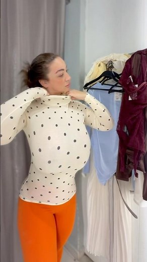 Trying on haul goes wrong with a turtle neck shirt.