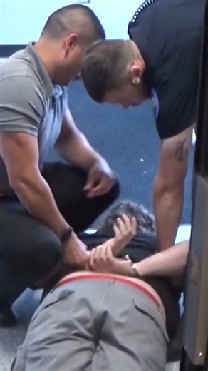 This teacher was arrested after clapping at a city meeting