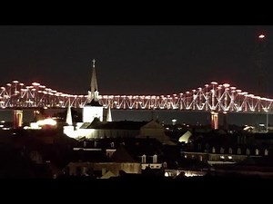 Why the Crescent City Connection glowed gold and white for one family Sunday night in New Orleans