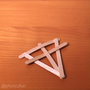 Popsicle Stick Bomb: Construction and Slow Motion Explosions https://www.physicsfunshop.com/category/recent-posts A form of simple tensegrity, the elastic potential energy of the bent sticks is dramatically released under application of a slight concussive force such as an impact with a table top- shown in forward and backward slow motion are four seperate explosions. Featured here is one of the simplest constructions with 5 flat sticks woven into a spring-loaded configuration held in place by f