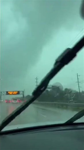 Tower Collapses onto Highway During Storm