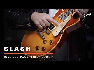 Slash shows Mark Agnesi the first-ever sunburst Les Paul guitar