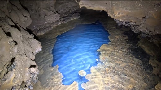 Deep Inside the Cave Strange Blue Holes Appeared in the Darkness