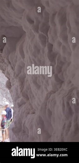 Cardona, Spain, August 20, 2025, tourists with hard hats exploring the unique geological formations of the Cardona salt mountain Stock Video Footage - Alamy