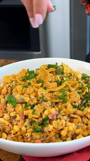 Not to be corny, but we are in love with Frito Corn Salad! 🌽 This crispy and vibrant dish is your new go-to for summer barbecues and potlucks. With corn as the ⭐️ , this easy appetizer is sure to disappear fast! Click the link in @allrecipes bio for the full recipe ⬆️ 🧑‍🍳: @craigruff_ 📸: @guacmylife #appetizers #quickandeasy #corn | Allrecipes