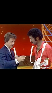 7.9K views · 237 reactions | Larry Graham showing off his unique microphone-mounted bass to Dick Clark on American Bandstand in 1980 | Bass Magazine | Facebook