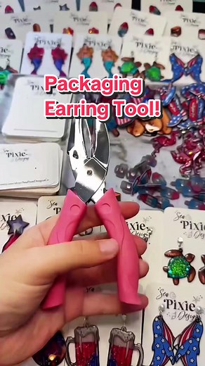 I love this new hole punch for my earring cards! It gives me a lot of flexibility in deciding where to place the holes, is mess-free, and fun to use! It’s linked in my storefront ❤️ #jewelry #jewelrymaking #handmadejewelry #packaging #jewelrybusiness #jewelrypackaging #earringbusiness #smallbusiness #earrings #handmadeearrings #earringspackaging #earringcards #shrinkplastic #shrinkplasticjewelry #cricut #cricutcraft #packanorderwithme #packingorders #fyp #foryou #foryoupage