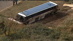 Tour bus overturns