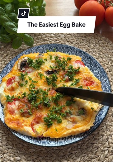 This Air Fryer Egg Bake Is Addictive 🤤 🥚 Ingredients: • 4 eggs • 1 tomato, sliced • Mushrooms, sliced • Leek, sliced • 4 slices of sausage, chopped • Grated cheese • Salt, to taste • Ground black pepper, to taste • Dried garlic, to taste 👩‍🍳 Instructions: 1. Whisk the eggs until smooth. 2. Add the tomato, mushrooms, leek, sausage, and grated cheese. 3. Season with salt, black pepper, and dried garlic. 4. Air fry at 340°F (170°C) for 10 minutes. 5. Enjoy while it’s hot and cheesy! Not an ad. 