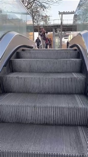 Outdoor ThyssenKrupp escalator at Porte de Vincennes metro station in Paris, France.