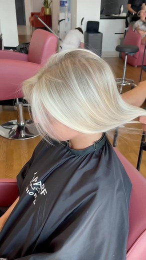 Platinum Blonde Hair Styling in Modern Salon