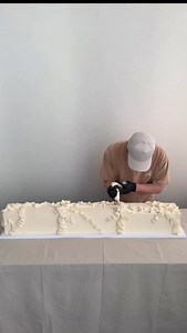 This cake is a beast - 1.2 metres to be exact! Building it from three blocks was a challenge, but the result is stunning. Custom board, layered texture, and piping details make it a standout. We had so much fun making it! 🤍 | K CAKE