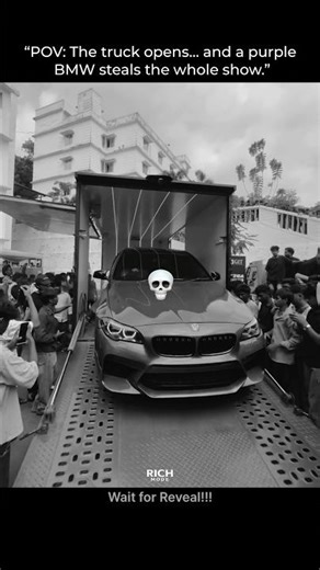 “POV: The truck opens… and a purple BMW steals the whole show.”