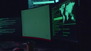 Isolated Mock-Up Green Screen And Code On Multiple Computer Screens, Cyber Attack