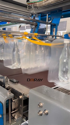 Beverage bottle one-piece heat shrink film wrapping machine,output 45-50 packs per minute #packingmachine #shrinkpackaging #shrinkwrappingmachine #manufacturer #factory #packagingmachine | Ella Wang
