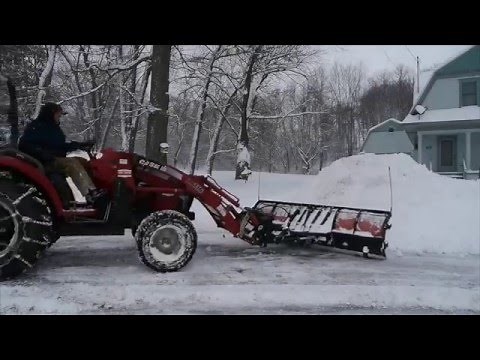 Tractor Plowing Snow with BIG Plow