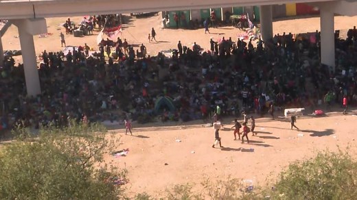 More than 9,500 migrants living under bridge at US border