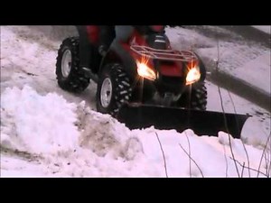ATV snow plowing Warn plow