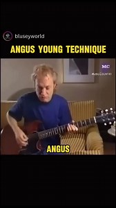 Angus Young technique. Angus Young (AC/DC's Guitarist) demonstrating his hybrid picking technique and playing Stiff Upper Lip Riff. #reelsviralシ #acdc #AngusYoung | Acdc Fan