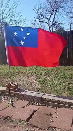 Big flag of Samoa waving in the wind