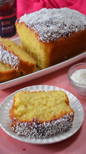 11K views · 82 reactions | Indulge in the delightful world of baking with my Coconut Loaf Cake tutorial! Learn how to create this mouthwatering treat topped with luscious raspberry jam and a sprinkle of desiccated coconut. #coconutcake #loafcake #coconut #coconutcakeshort | Scrummy | Facebook