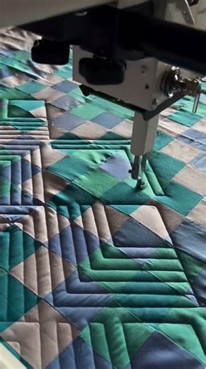 Industrial Sewing: Close-up of a Quilting Machine in Action