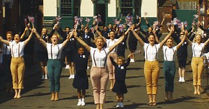 The D-Day Darlings perform ‘Bless ‘Em All’ in a small British town