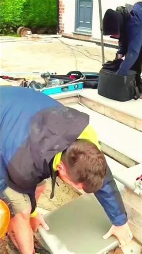 The technique of a carpenter laying square stones to make steps #shorts