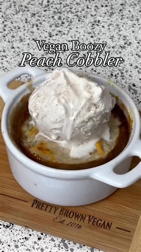 21K views · 433 reactions | Vegan Peach Cobbler  this recipe is in my 100 Vegan Meals Cookbook  | Pretty Brown Vegan LLC | Facebook
