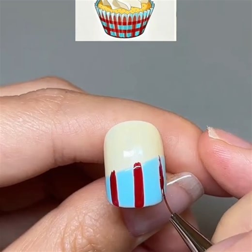 Vietart Nails on Instagram: "Sweet Treats! Adorable 3D Cherry Cupcake Nail Art Turn your fingertips into a "sweet feast" with this ultra-cute Cherry Cupcake design. This video guides you through painting a classic blue and red plaid pattern, topped with 3D white frosting and a juicy red cherry. The perfect nail look for those who love a youthful and playful aesthetic. #nailselfie #nailworld #nailselfie #nailinspiration #nailbox #nailart"
