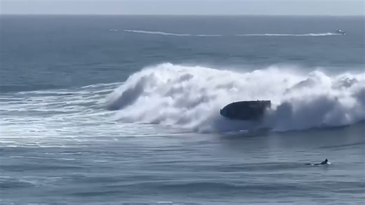 Six rescued after boat capsizes in heavy surf off West Cliff Drive