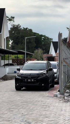 Showcasing Various Parked Car Models in Neighborhood