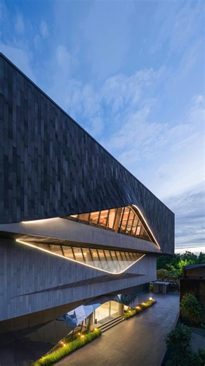 RAD+AR on Instagram: "Passive Design as Vernacular Response to Tropical Urbanism The project proposes a commercial office typology rooted in climatic responsiveness, where the building’s massing and formal geometry serve as the primary cooling mechanism. By prioritizing passive design strategies, the architecture moves beyond mere aesthetics to become a functional performative shell. Solar Geometry and Self-Shading Facades, The building envelope rejects the traditional flat curtain wall in favor