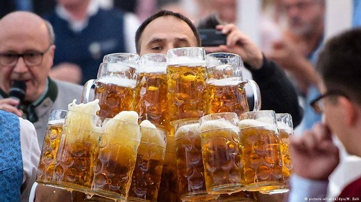 1.2M views · 243 reactions | A waiter carrying 29 beer steins at once is the most German thing you'll see  | DW News | Facebook