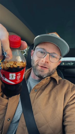 Adam Busby on Instagram: "Ever had Coke with peanuts? Parker wasn’t a fan…"