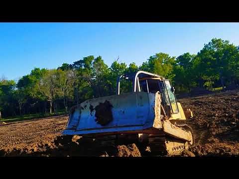 Pond building!! John Deere 750J bulldozer digging sticky clay.