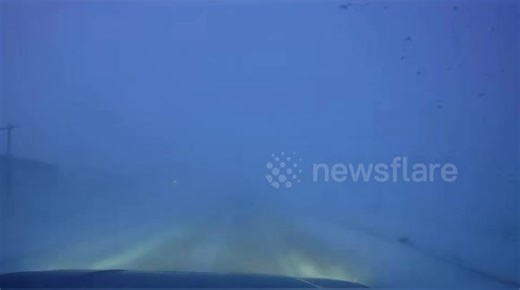US: Whiteout Blizzard Strands Travelers North Of Ames With 60 Mph Winds And Treacherous Roads
