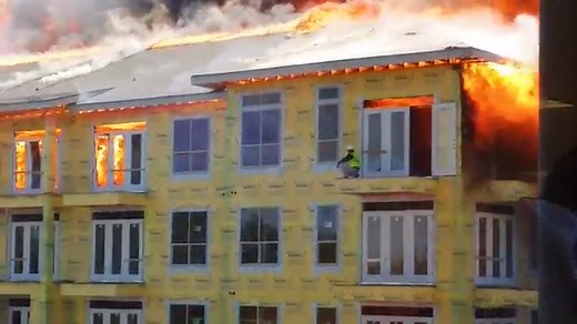 Incredible video shows construction worker's dramatic rescue from burning Houston building