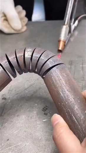 Torch cutting metal pipe producing bright flying sparks #construction #popular